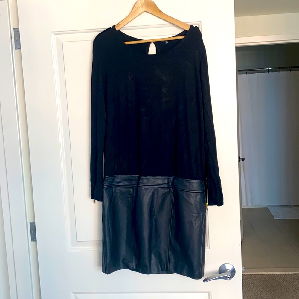 Sexy leather black one piece outfit.